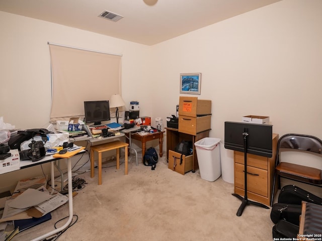 office area with light colored carpet and visible vents
