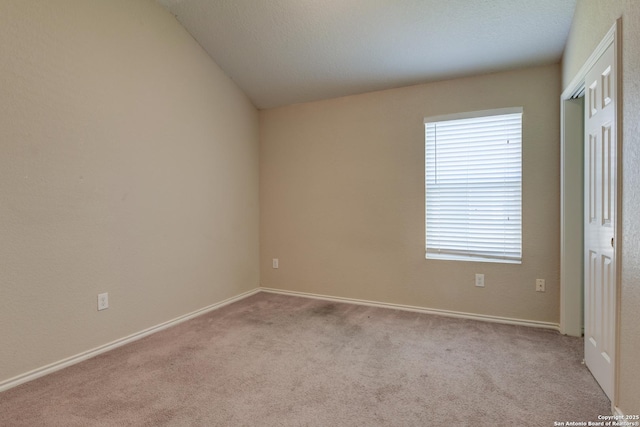7614 Copper Dawn, Converse, TX 78109 - unfurnished room featuring carpet flooring, vaulted ceiling, and baseboards