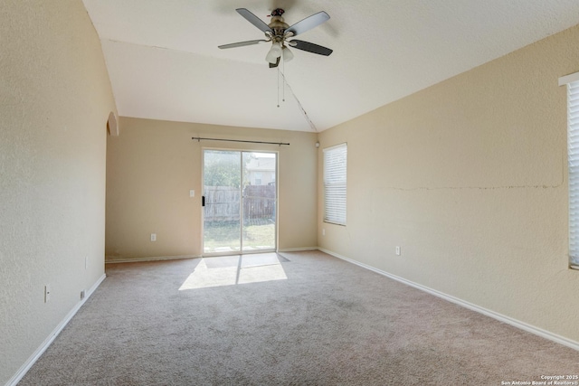 7614 Copper Dawn, Converse, TX 78109 - empty room featuring a textured wall, vaulted ceiling, carpet floors, ceiling fan, and baseboards