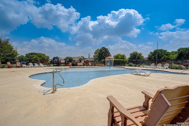 8439 Painted Wagon, San Antonio, TX 78254 - community pool with fence and a patio area