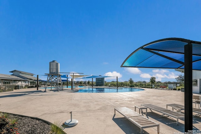 community pool featuring a patio