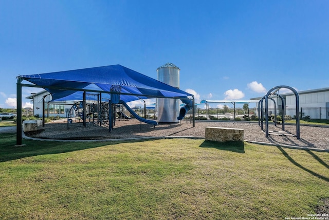 communal playground with a lawn