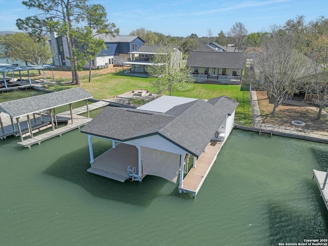 411 W Greenbriar Dr, Granite Shoals, TX 78654 - aerial view with a residential view and a water view