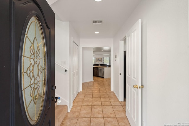 411 W Greenbriar Dr, Granite Shoals, TX 78654 - hall featuring recessed lighting, light tile patterned flooring, baseboards, and visible vents