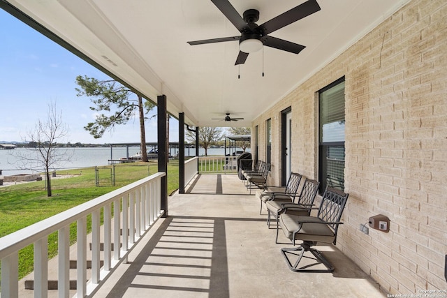 411 W Greenbriar Dr, Granite Shoals, TX 78654 - view of patio featuring a water view, a porch, and a ceiling fan