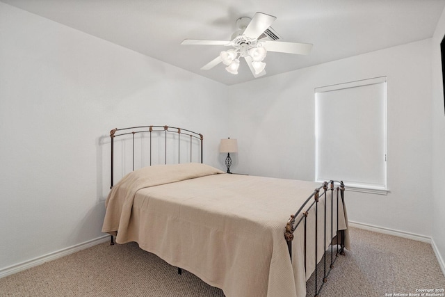 411 W Greenbriar Dr, Granite Shoals, TX 78654 - bedroom with carpet floors, baseboards, and ceiling fan
