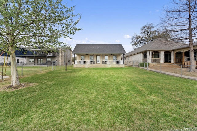 411 W Greenbriar Dr, Granite Shoals, TX 78654 - back of house featuring a fenced backyard, a shingled roof, and a yard