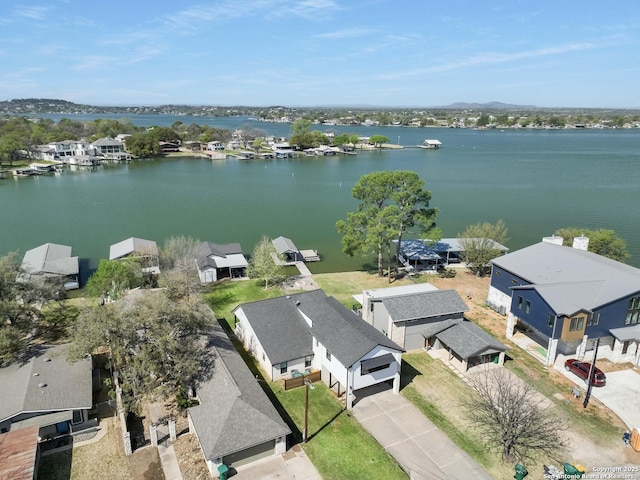 411 W Greenbriar Dr, Granite Shoals, TX 78654 - drone / aerial view featuring a water view and a residential view