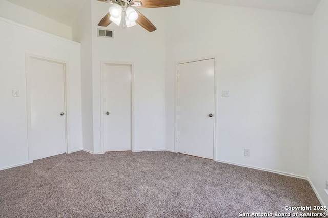 unfurnished bedroom with visible vents and carpet