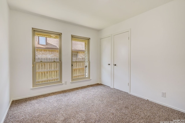 empty room featuring carpet