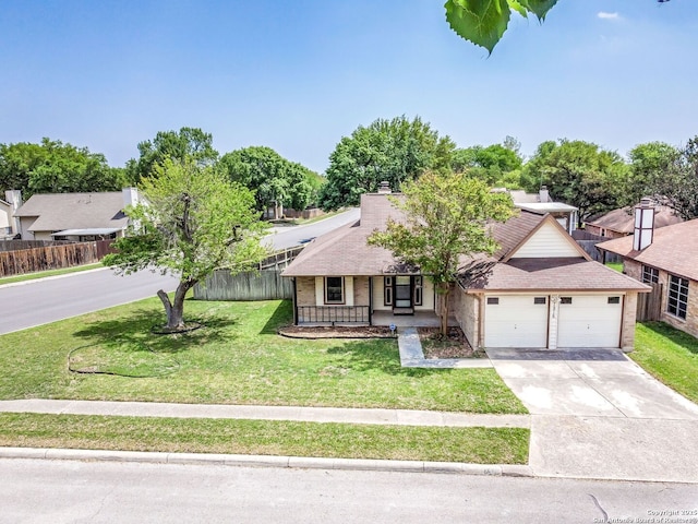 view of front of home featuring fence, an attached garage, a front yard, driveway, and a porch