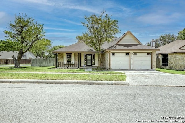 view of front of house featuring fence, an attached garage, a front lawn, driveway, and a porch