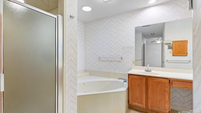 full bath featuring vanity, recessed lighting, a shower stall, a tub with jets, and visible vents