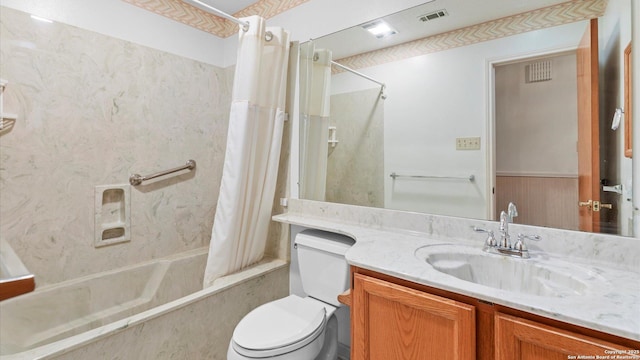 bathroom with visible vents, toilet, vanity, and shower / bath combo with shower curtain