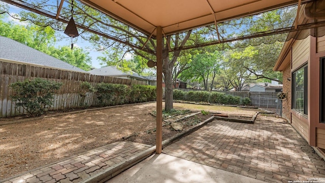 view of patio with a fenced backyard