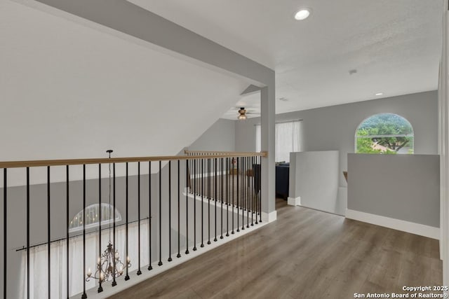 5038 Fawn Lake Dr, San Antonio, TX 78244 - hallway with recessed lighting, baseboards, and wood finished floors