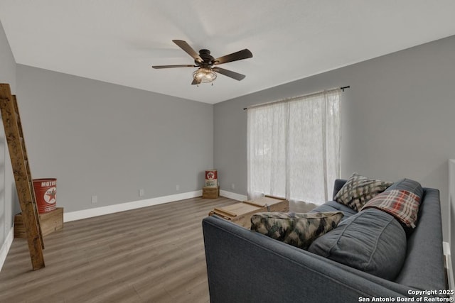 5038 Fawn Lake Dr, San Antonio, TX 78244 - living room featuring baseboards, ceiling fan, and wood finished floors