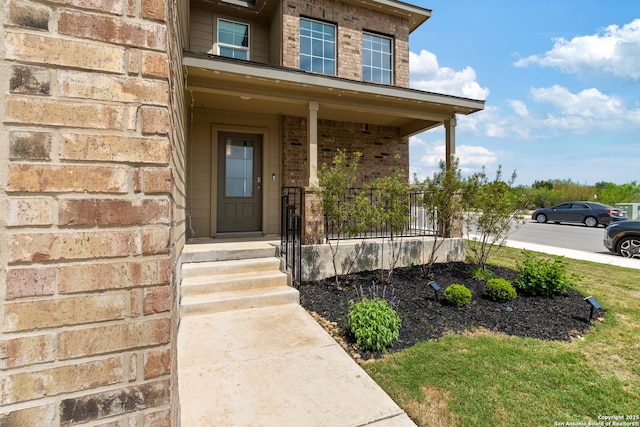 147 Festive Coquette, San Antonio, TX 78253 - property entrance with covered porch and brick siding