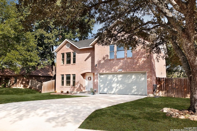 7102 Valley Trl, San Antonio, TX 78250 - traditional-style home featuring driveway, brick siding, fence, and a garage