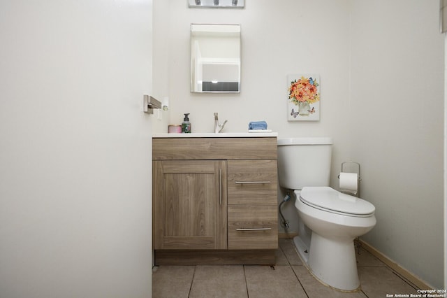 7102 Valley Trl, San Antonio, TX 78250 - half bath featuring baseboards, toilet, tile patterned flooring, and vanity