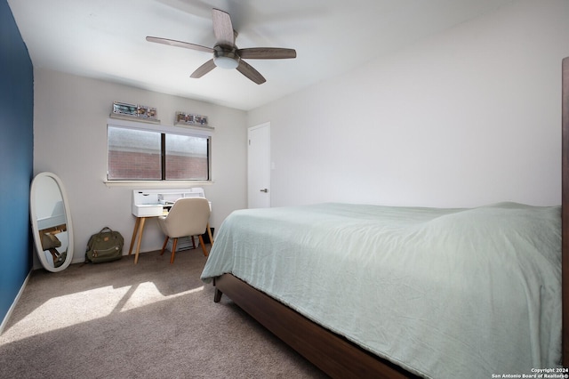 7102 Valley Trl, San Antonio, TX 78250 - carpeted bedroom featuring baseboards and a ceiling fan
