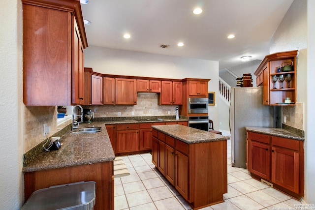 19423 Camino Rdg, San Antonio, TX 78258 - kitchen featuring a sink, stainless steel oven, decorative backsplash, a center island, and recessed lighting