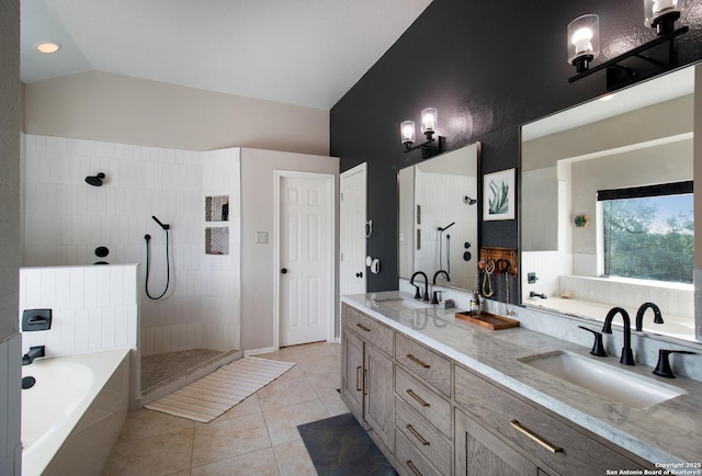 19423 Camino Rdg, San Antonio, TX 78258 - bathroom with lofted ceiling, a walk in shower, tile patterned floors, a garden tub, and double vanity