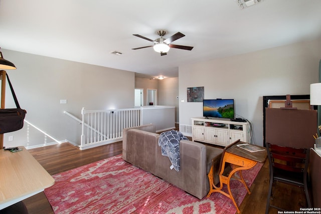 19423 Camino Rdg, San Antonio, TX 78258 - living area with wood finished floors, ceiling fan, and baseboards