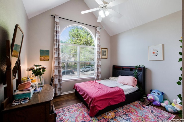 19423 Camino Rdg, San Antonio, TX 78258 - bedroom with vaulted ceiling, dark wood-type flooring, multiple windows, and a ceiling fan