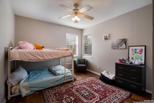 19423 Camino Rdg, San Antonio, TX 78258 - bedroom with wood finished floors, a ceiling fan, and baseboards
