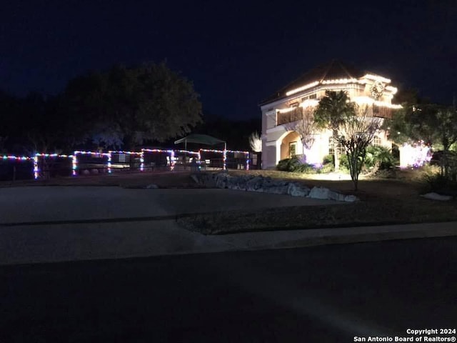 19423 Camino Rdg, San Antonio, TX 78258 - view of property exterior at twilight