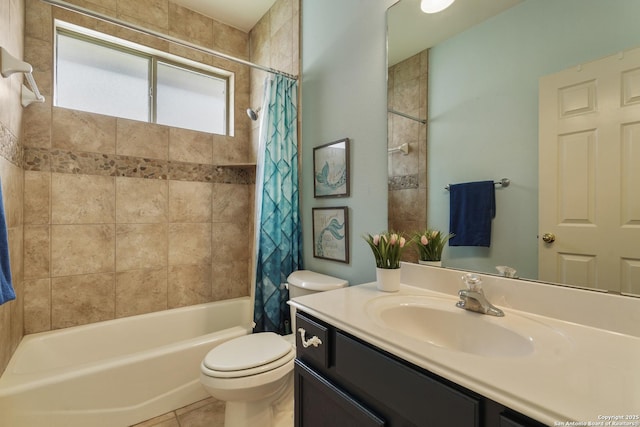 bathroom featuring vanity, tile patterned floors, shower / bath combo, and toilet