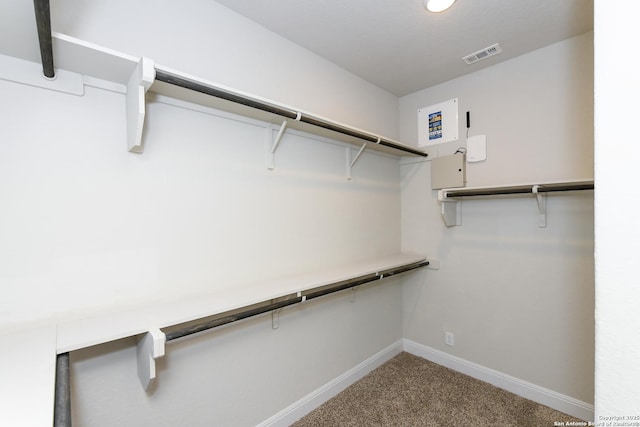 walk in closet featuring carpet floors and visible vents