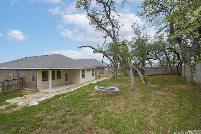 view of yard featuring a fenced backyard and a patio