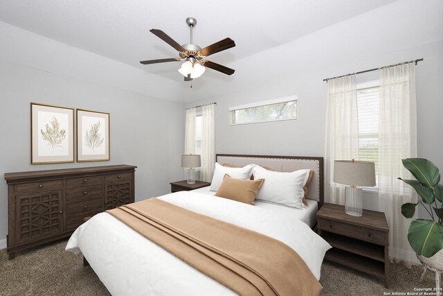 carpeted bedroom with ceiling fan