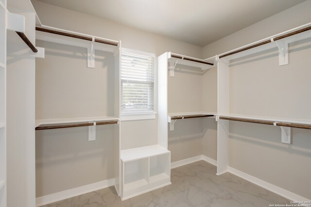 122 Hi Vw, Lakehills, TX 78063 - spacious closet featuring light marble finish floors