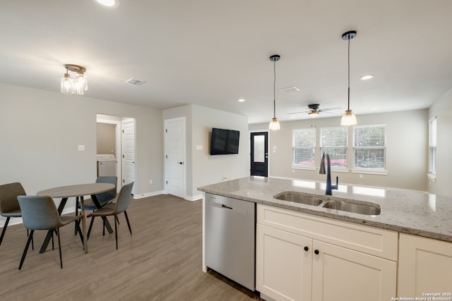 122 Hi Vw, Lakehills, TX 78063 - kitchen featuring dishwasher, a sink, hanging light fixtures, white cabinets, and ceiling fan