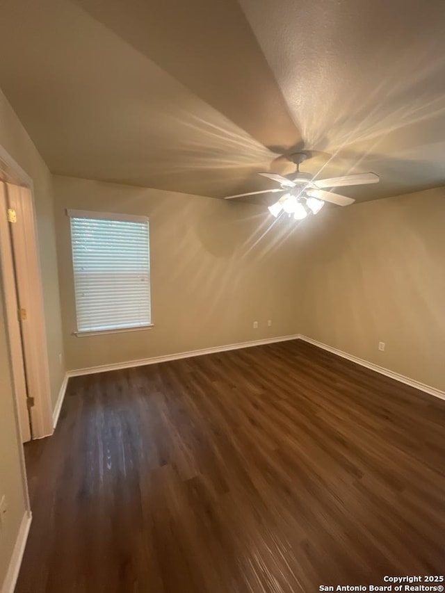 7126 Tourant, San Antonio, TX 78240 - unfurnished bedroom with baseboards, a ceiling fan, lofted ceiling, and dark wood-style floors