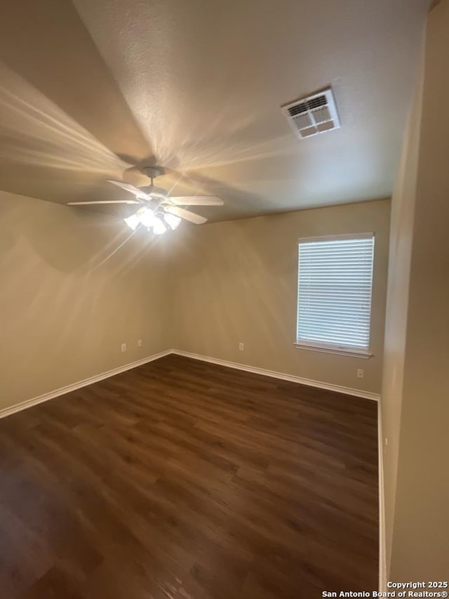 7126 Tourant, San Antonio, TX 78240 - empty room with baseboards, dark wood-style flooring, ceiling fan, and visible vents