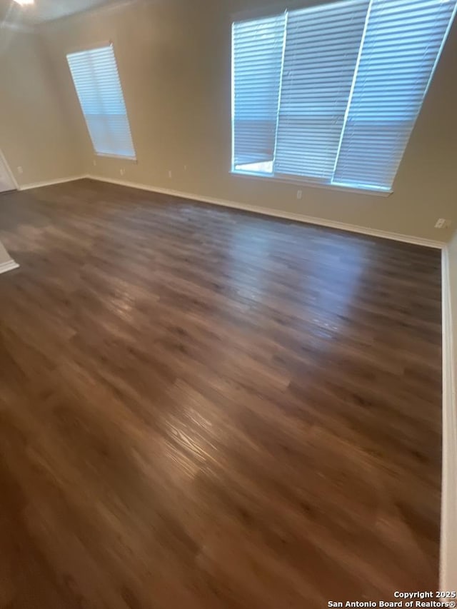 7126 Tourant, San Antonio, TX 78240 - spare room featuring dark wood-style flooring and baseboards