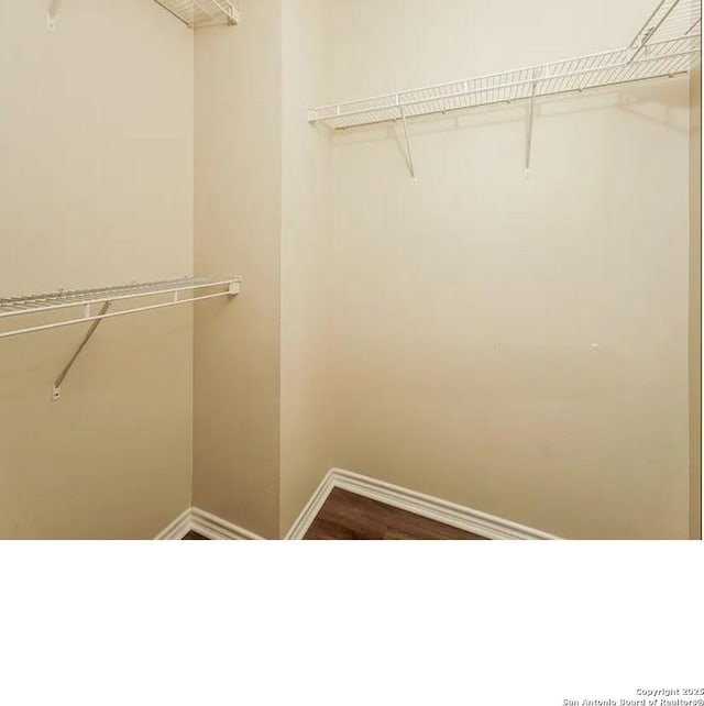 7126 Tourant, San Antonio, TX 78240 - spacious closet featuring dark wood finished floors