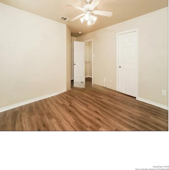 7126 Tourant, San Antonio, TX 78240 - unfurnished bedroom featuring baseboards, a ceiling fan, visible vents, and wood finished floors