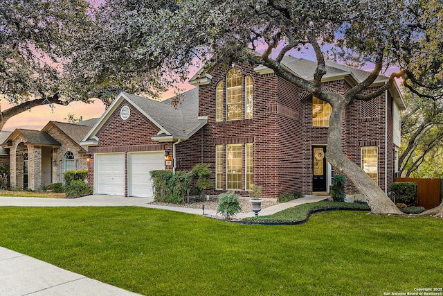 13911 Laurelbrook, San Antonio, TX 78249 - traditional-style home with a lawn, driveway, a garage, and brick siding
