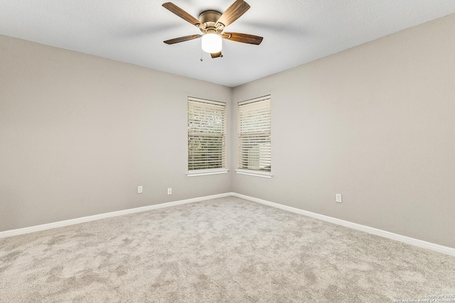 13911 Laurelbrook, San Antonio, TX 78249 - carpeted spare room with baseboards, ceiling fan, and a textured ceiling