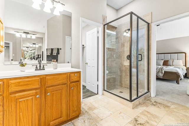13911 Laurelbrook, San Antonio, TX 78249 - ensuite bathroom featuring vanity, a notable chandelier, a stall shower, and ensuite bath