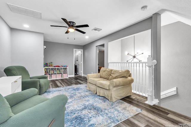24704 Killarney St, Hempstead, TX 77445 - living room featuring baseboards, a ceiling fan, wood finished floors, and visible vents