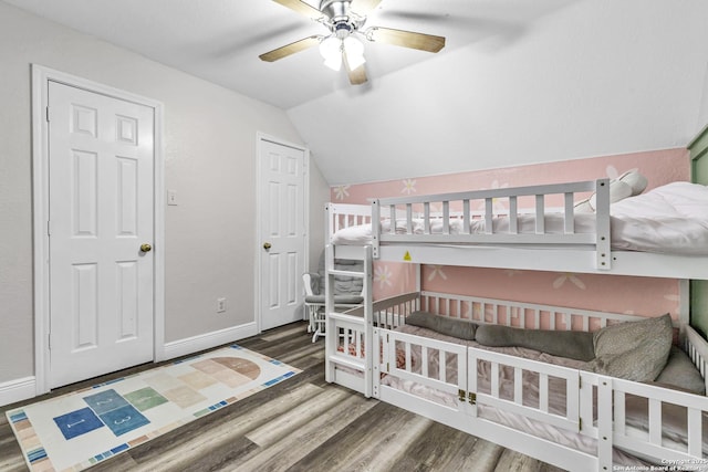 24704 Killarney St, Hempstead, TX 77445 - bedroom with vaulted ceiling, wood finished floors, a ceiling fan, and baseboards
