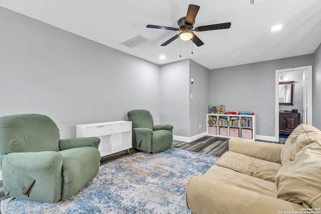 24704 Killarney St, Hempstead, TX 77445 - living room with visible vents, baseboards, recessed lighting, wood finished floors, and ceiling fan