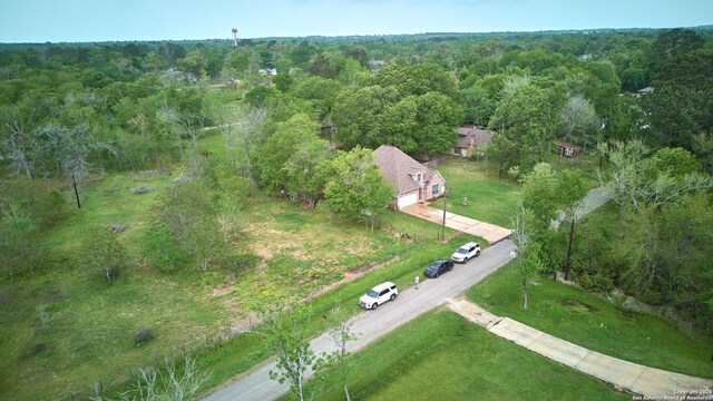 24704 Killarney St, Hempstead, TX 77445 - drone / aerial view featuring a forest view