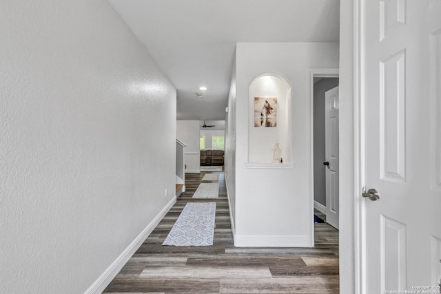 24704 Killarney St, Hempstead, TX 77445 - hall featuring baseboards, wood finished floors, and recessed lighting